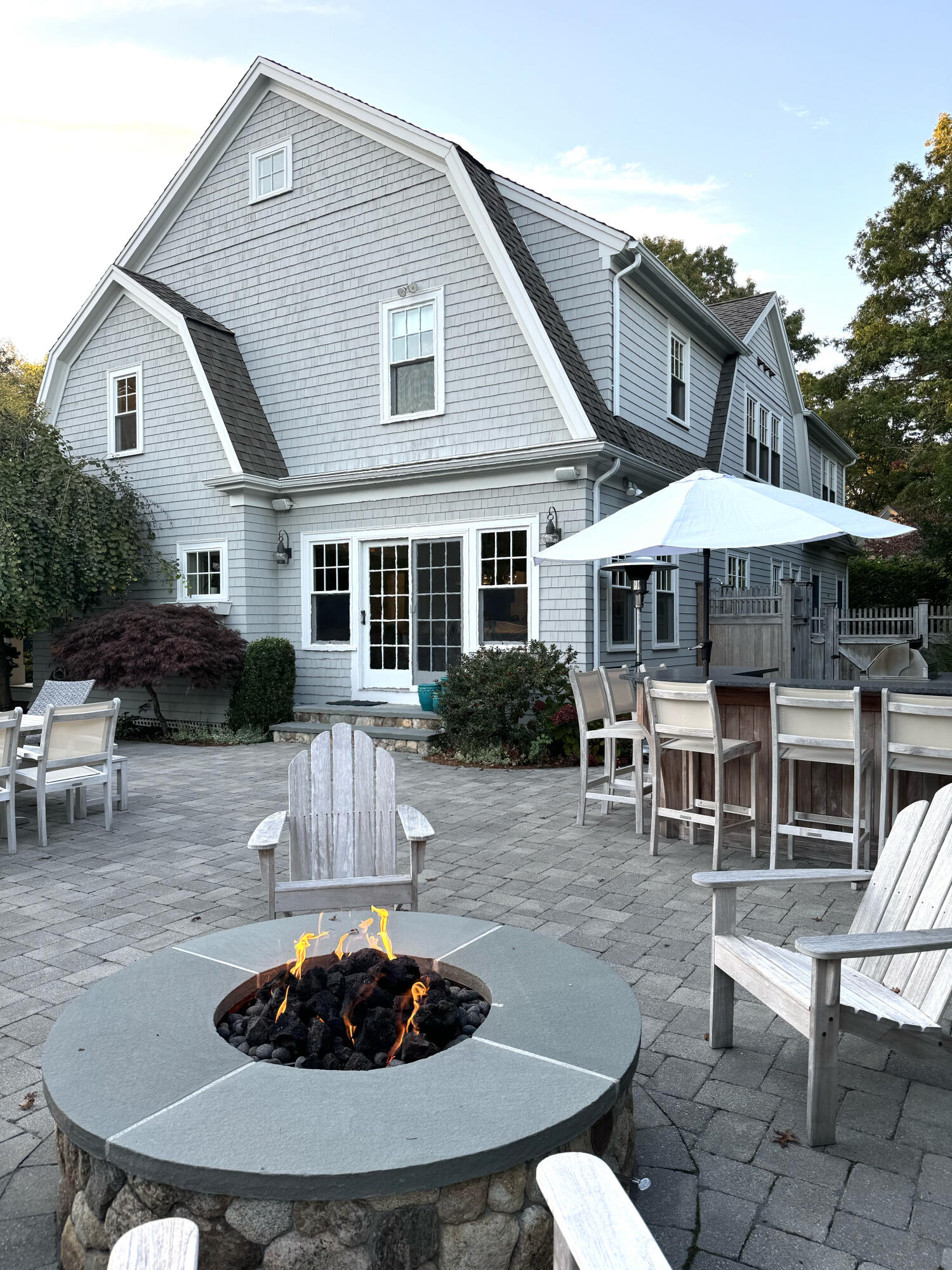 107 Summersea Road Mashpee, MA 02649 - Photo 25 of 29 a patio with a table and chairs