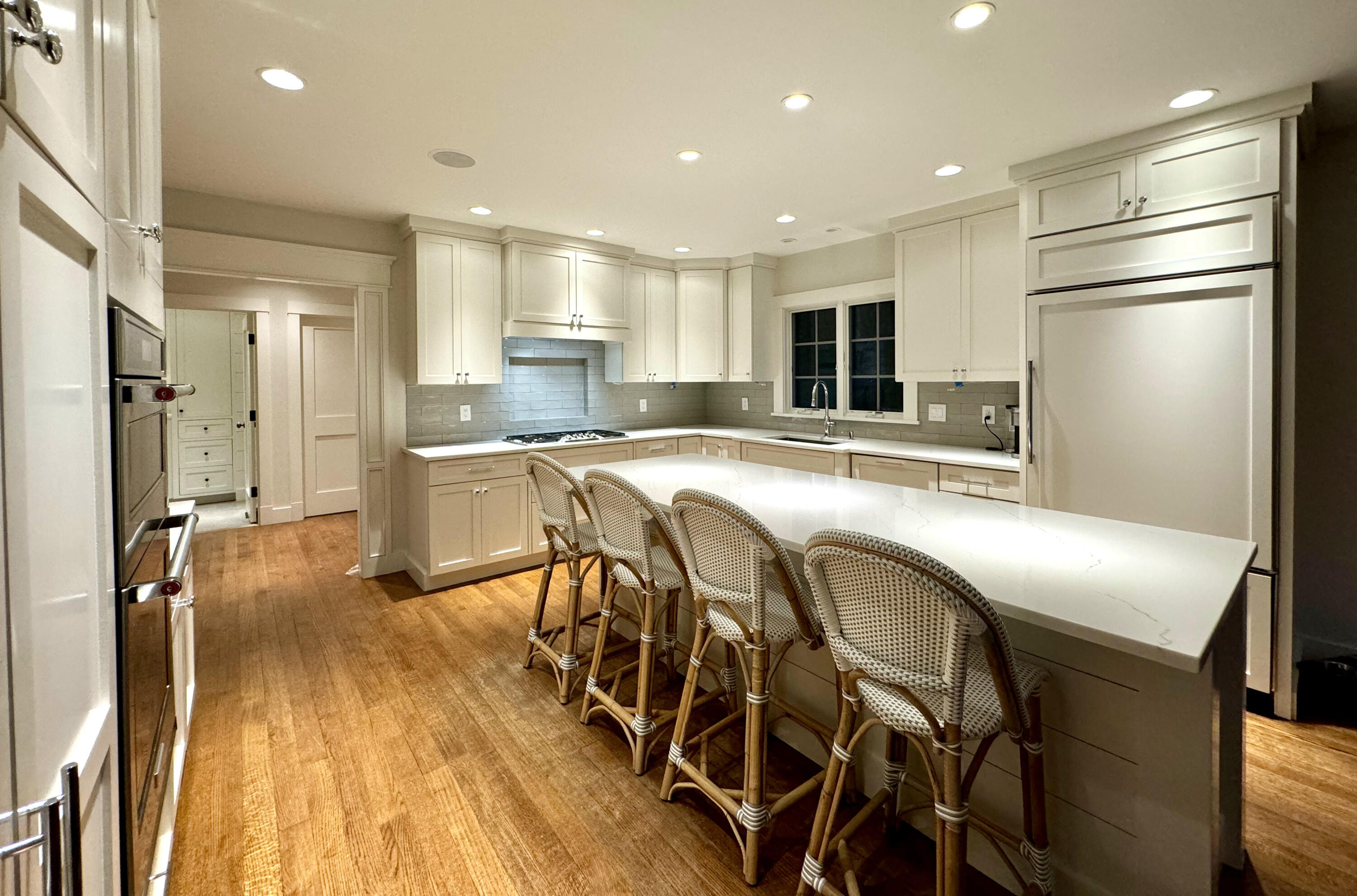 107 Summersea Road Mashpee, MA 02649 - Photo 9 of 29 a kitchen with stainless steel appliances granite countertop a dining table chairs refrigerator and microwave
