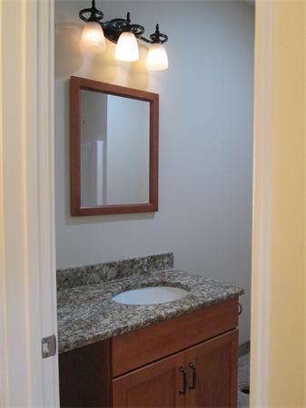 72 Glendale Road Southampton, MA 01073 - Photo 11 of 21 a bathroom with a granite countertop sink and a mirror