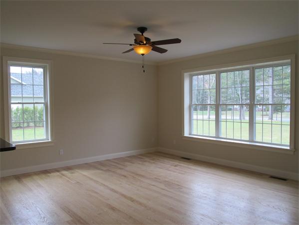 72 Glendale Road Southampton, MA 01073 - Photo 4 of 21 a view of an empty room with wooden floor and a window