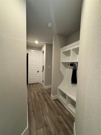 a bedroom with a bed window and couch