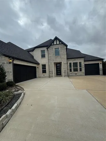 a front view of house with garage