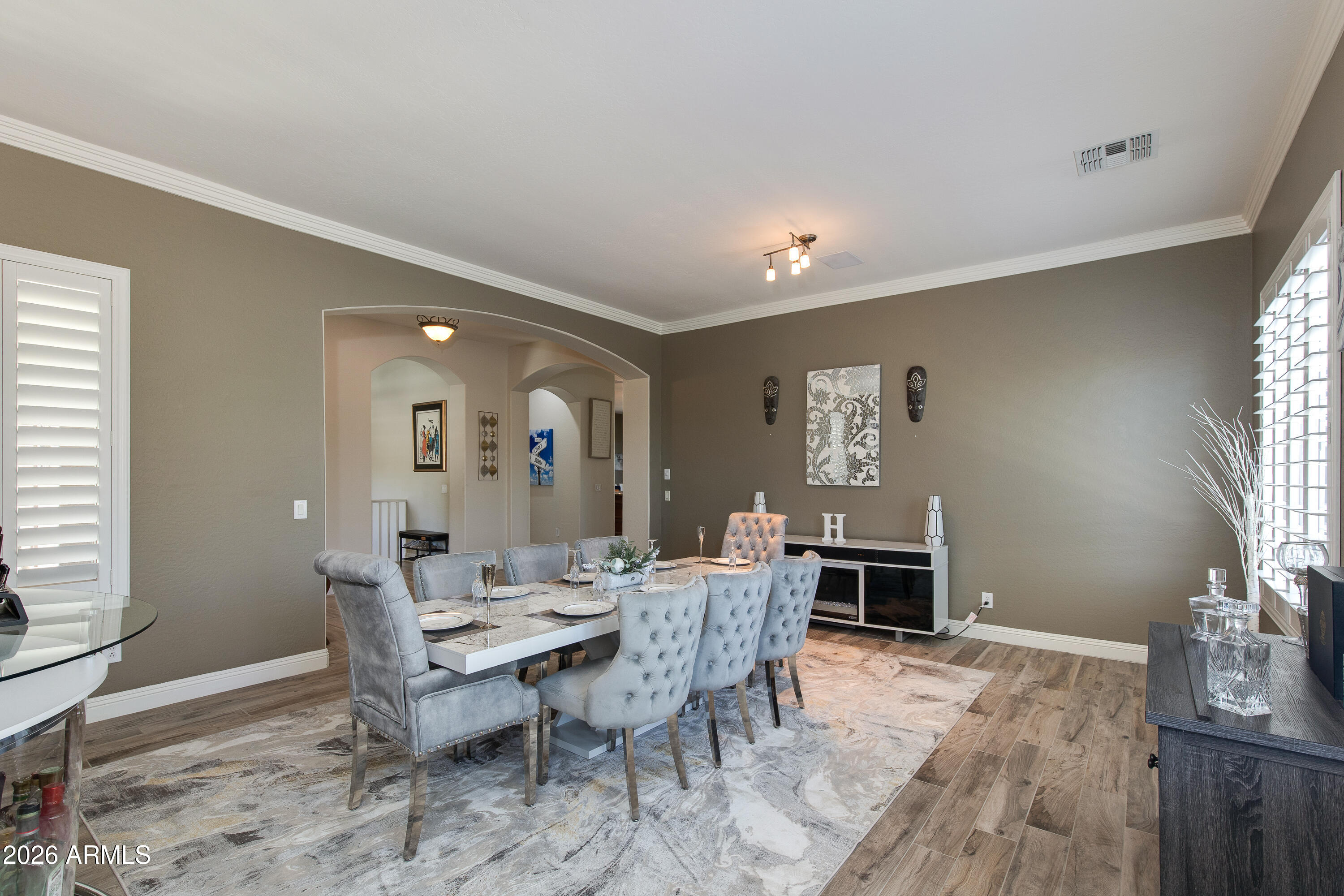 7718 North 84th Lane Glendale, AZ 85305 - Photo 7 of 82 a view of a dining room with furniture