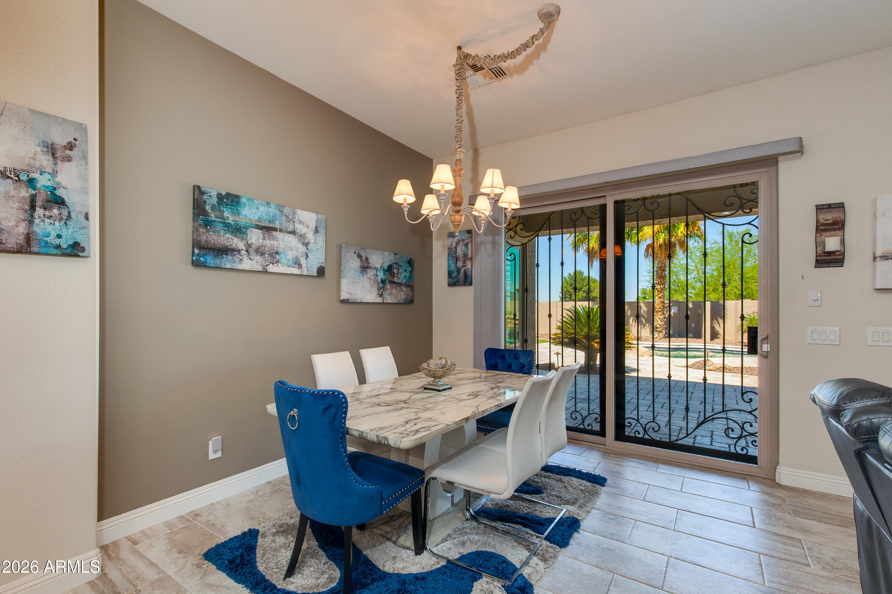 7718 North 84th Lane Glendale, AZ 85305 - Photo 19 of 82 a workspace with furniture and window