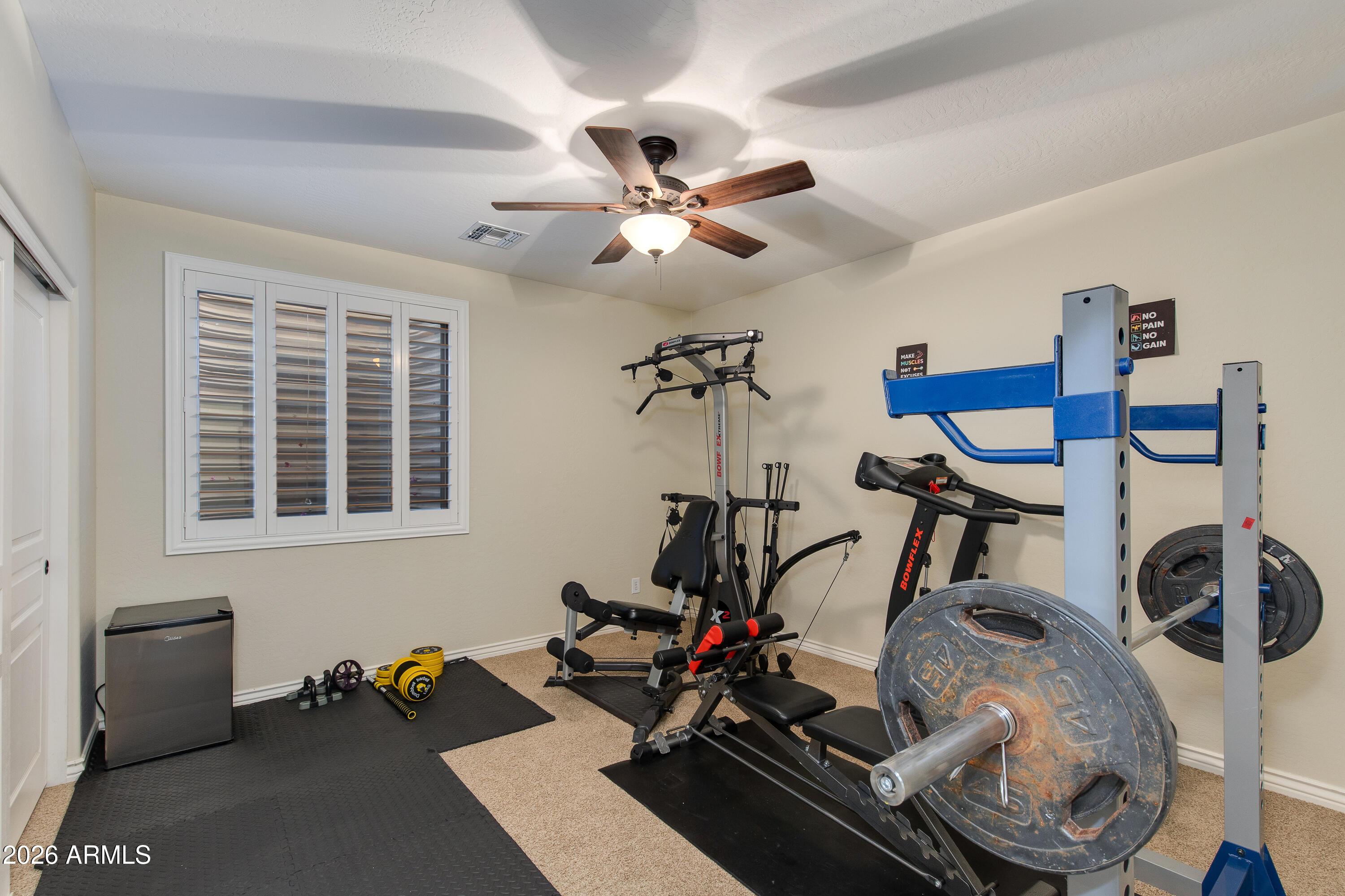 7718 North 84th Lane Glendale, AZ 85305 - Photo 48 of 82 a view of a room with gym equipment