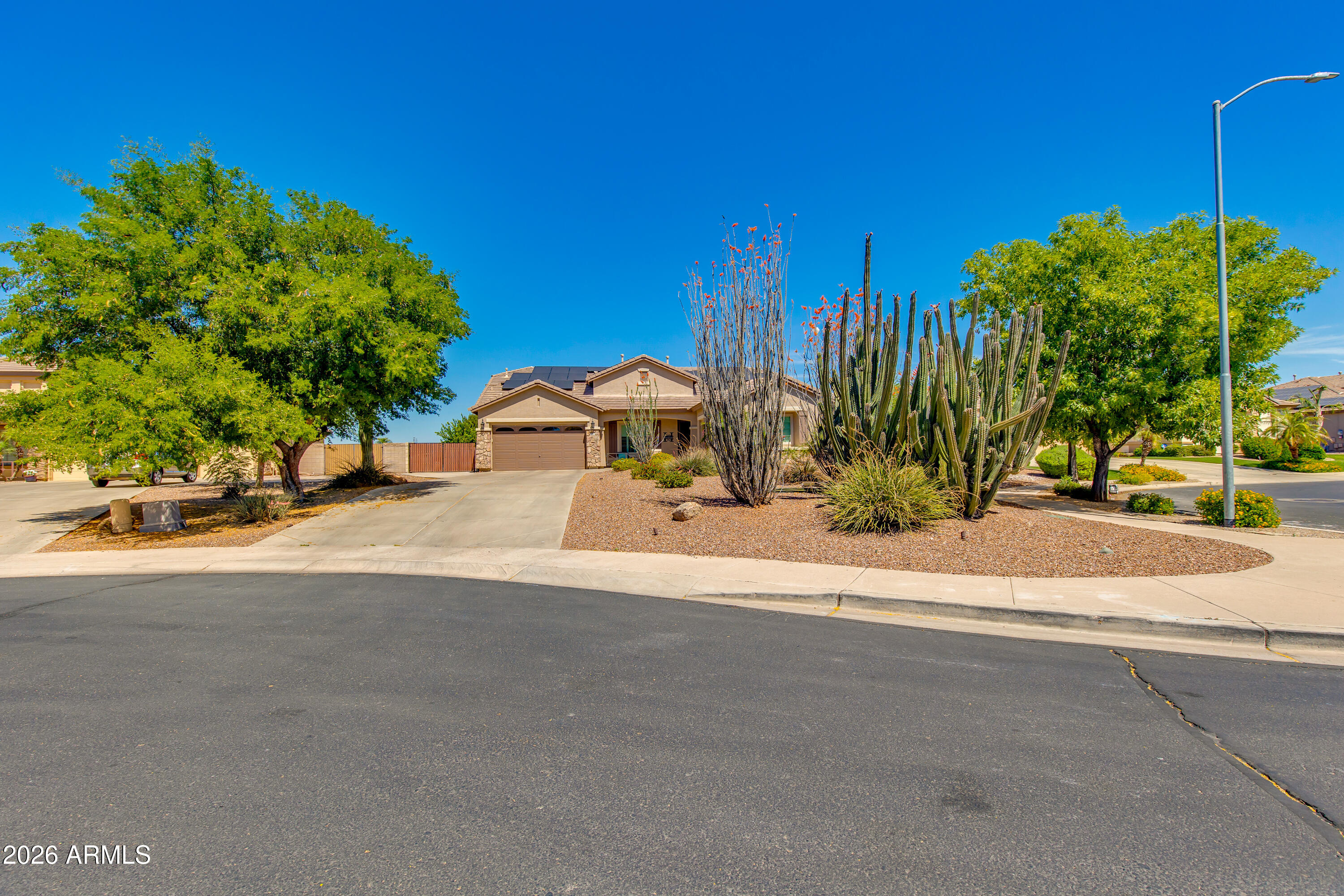 7718 North 84th Lane Glendale, AZ 85305 - Photo 76 of 82 a view of a street with a building in the background