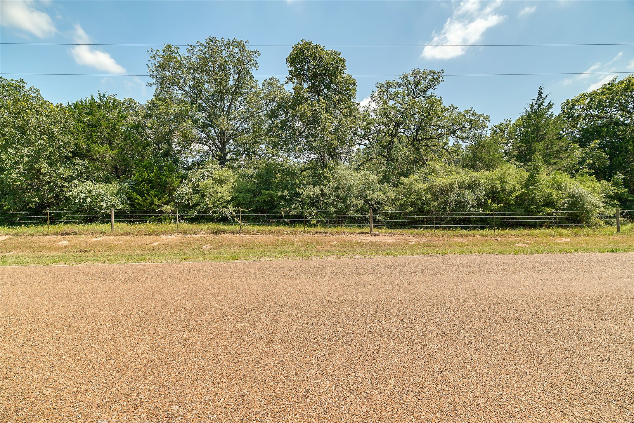 0 County Road 215 Weimar, TX 78962 - Photo 6 of 44 a view of a swimming pool and an outdoor space