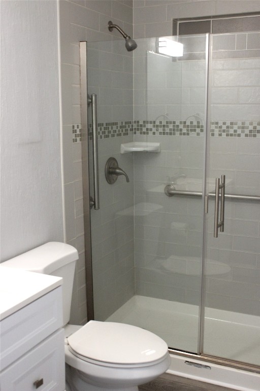 3300 Fritz Hughes Park Road Austin, TX 78732 - Photo 12 of 25 a white toilet next to a bathroom shower