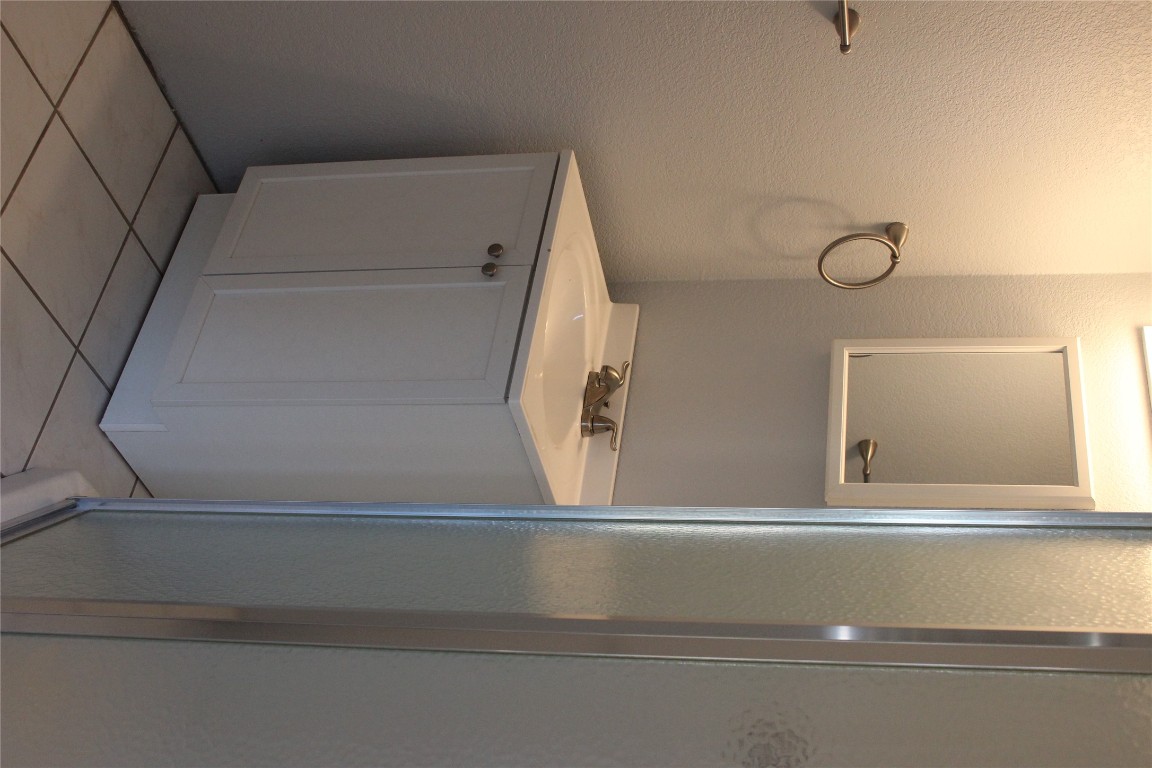 3300 Fritz Hughes Park Road Austin, TX 78732 - Photo 15 of 25 a utility room with a sink