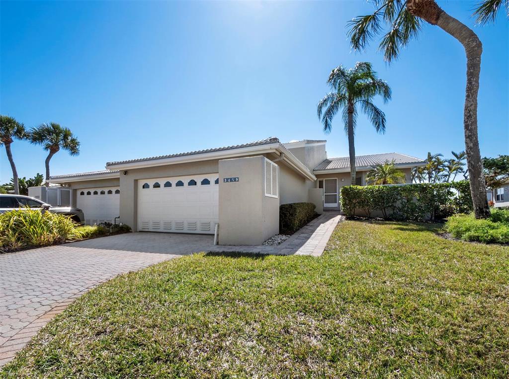 3459 Byron Lane Longboat Key, FL 34228 - Photo 1 of 40 a view of a backyard of the house
