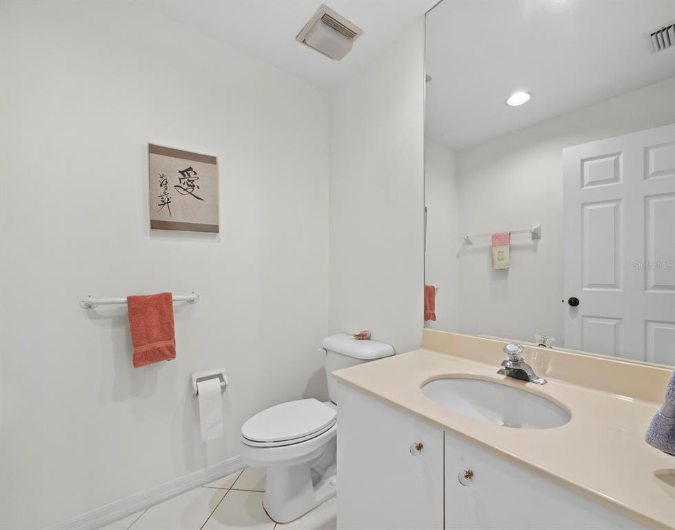3459 Byron Lane Longboat Key, FL 34228 - Photo 19 of 40 a bathroom with a sink and a toilet