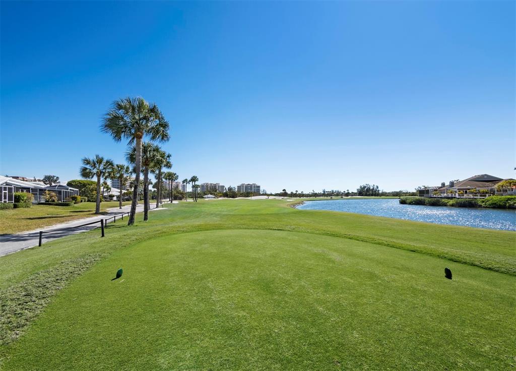 3459 Byron Lane Longboat Key, FL 34228 - Photo 24 of 40 a view of a golf course with a lake view