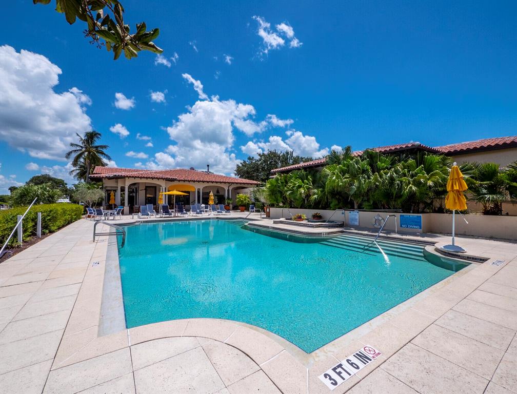3459 Byron Lane Longboat Key, FL 34228 - Photo 30 of 40 a view of a swimming pool with a patio