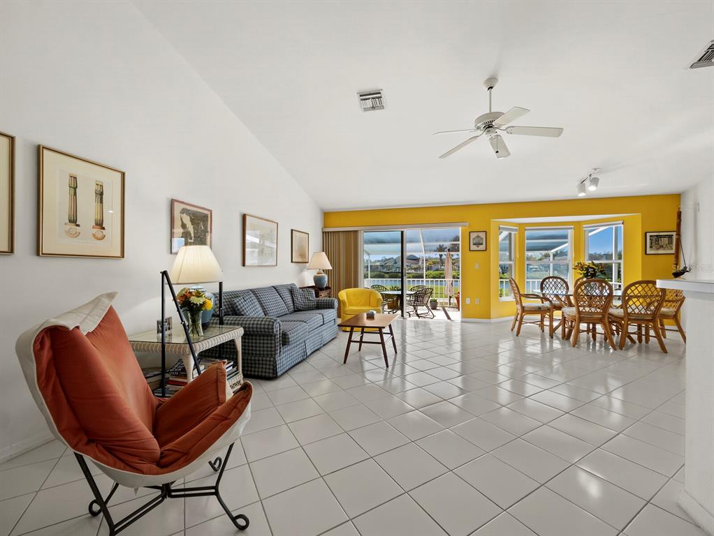 3459 Byron Lane Longboat Key, FL 34228 - Photo 5 of 40 a living room with furniture and floor to ceiling window