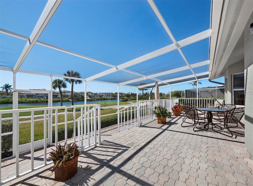 3459 Byron Lane Longboat Key, FL 34228 - Photo 8 of 40 a view of a chairs and table in the balcony