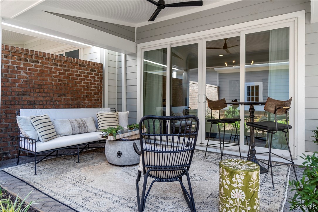 2536 Pagehurst Drive, Unit 7 Midlothian, VA 23113 - Photo 41 of 42 a outdoor living with furniture and garden view