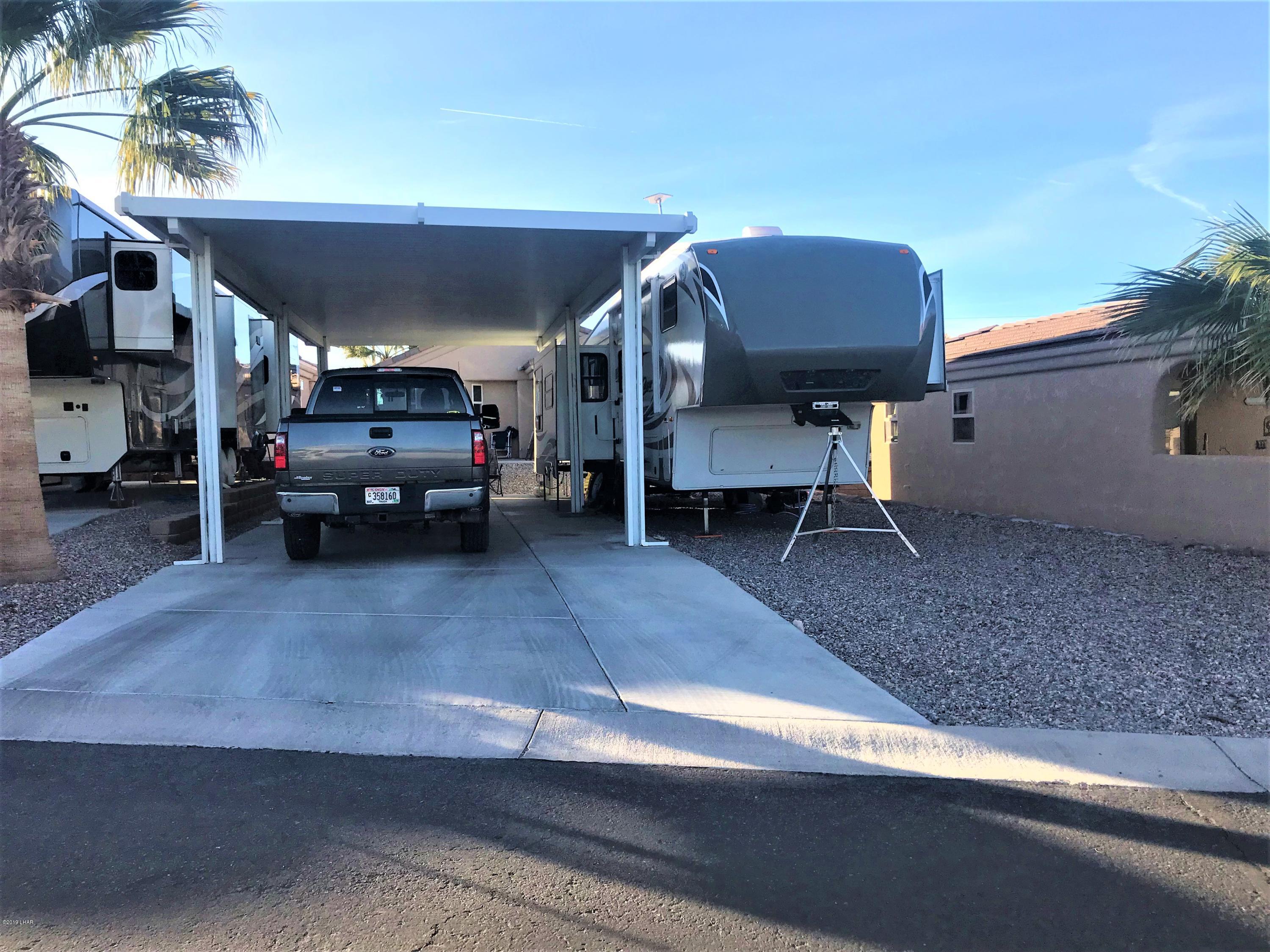 1905 Victoria Farms Road Lake Havasu City, AZ 86404 - Photo 1 of 1 a view of a cars park in front of a building
