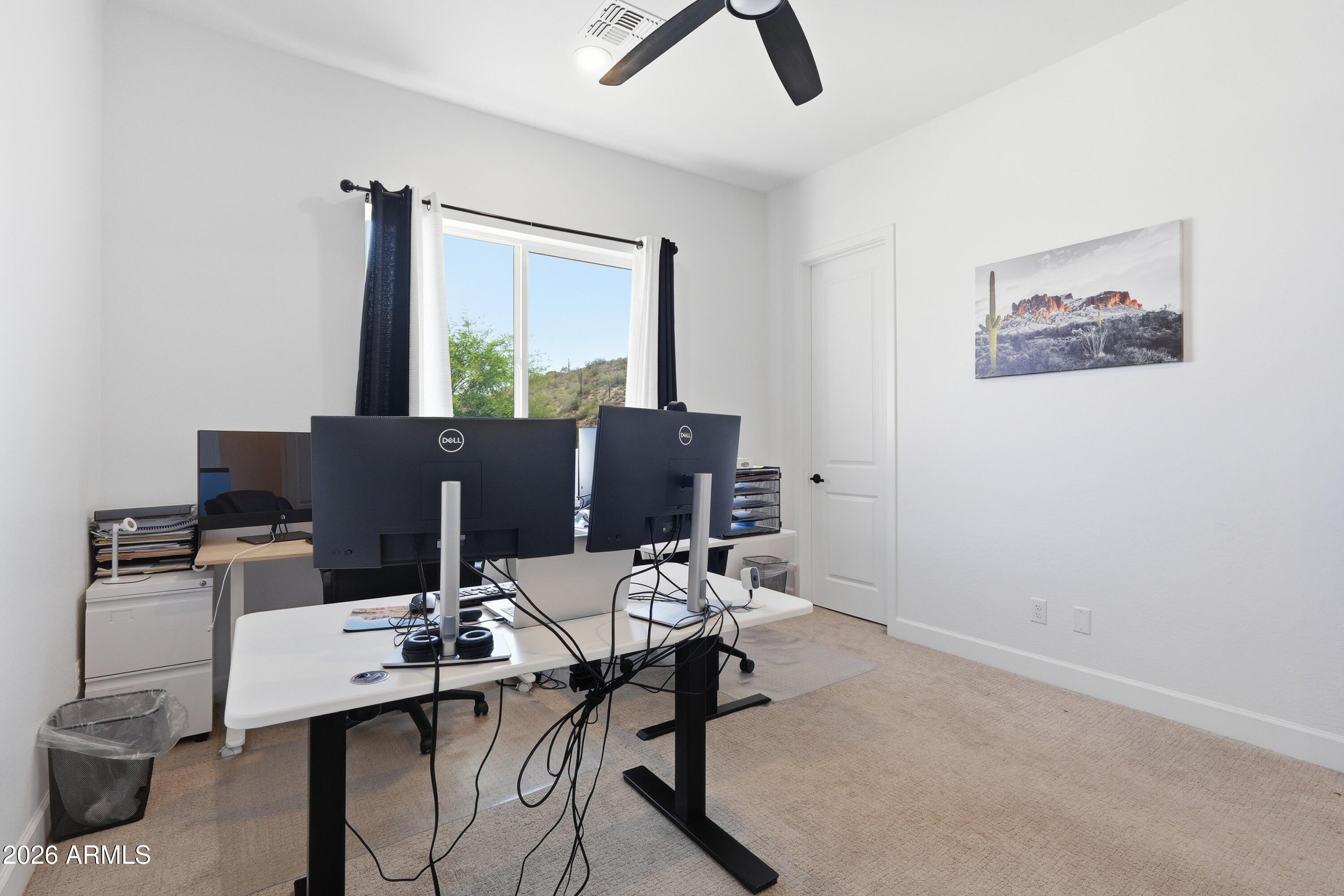 10464 East Magnolia Road Gold Canyon, AZ 85118 - Photo 32 of 77 a view of a workspace with furniture and a window