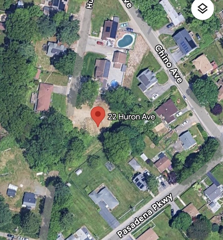 an aerial view of residential house with outdoor space and street view