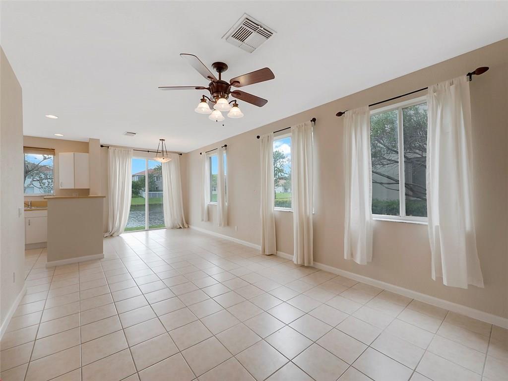 3075 Laurel Ridge Circle Riviera Beach, FL 33404 - Photo 2 of 12 a view of an empty room with a window