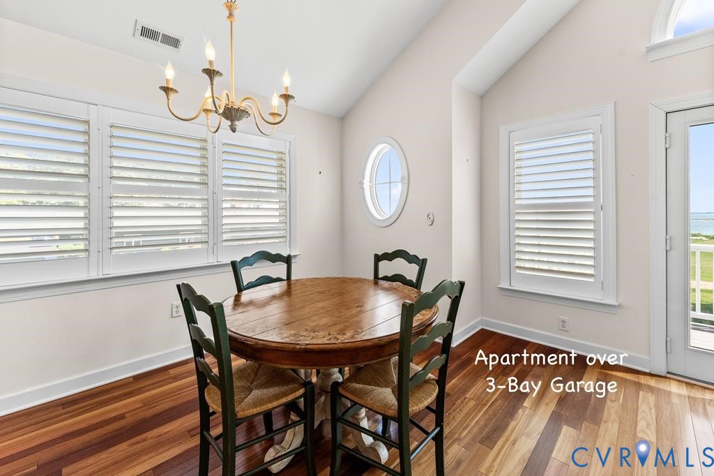 2414 Windmill Point Road White Stone, VA 22578 - Photo 45 of 72 a dining room with furniture and window