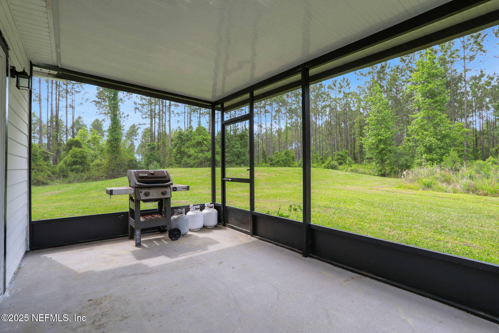 56041 Griffin Road Callahan, FL 32011 - Photo 3 of 49 3 Screened-In Patio