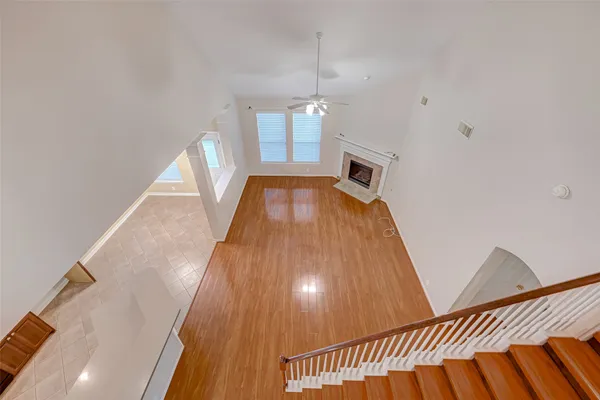 a view of a livingroom with wooden floor