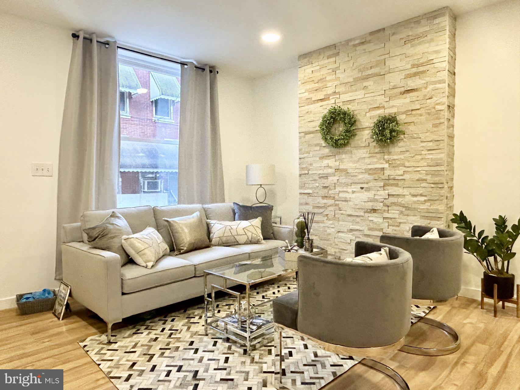 2013 South Bouvier Street Philadelphia, PA 19145 - Photo 2 of 18 a living room with furniture and a window