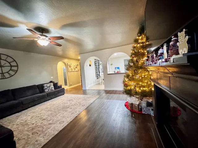 a kitchen with stainless steel appliances granite countertop a stove top oven and cabinets