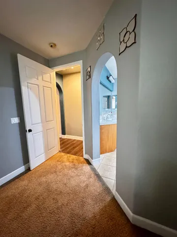 a room with a table and chairs