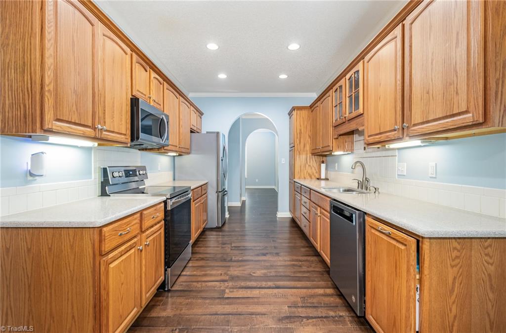 339 Old Burkhart Road Lexington, NC 27292 - Photo 12 of 39 You will appreciate the convenience and amenities of this galley style kitchen. With easy to access pull-out trays in cabinets and drawer dividers, all utensils and cookware can be kept in order for the chef!