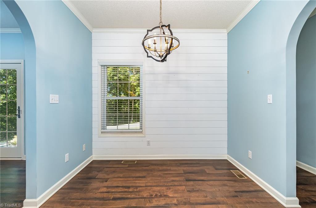 339 Old Burkhart Road Lexington, NC 27292 - Photo 17 of 39 Breakfast/casual eating area with "shiplap" type accent wall