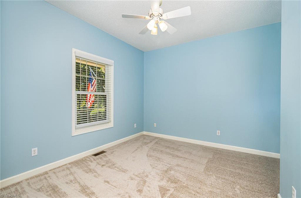 339 Old Burkhart Road Lexington, NC 27292 - Photo 26 of 39 This room has a multi-use appeal: LR, office, playroom, music room. New carpet installed 9/2025 is fresh and neutral.