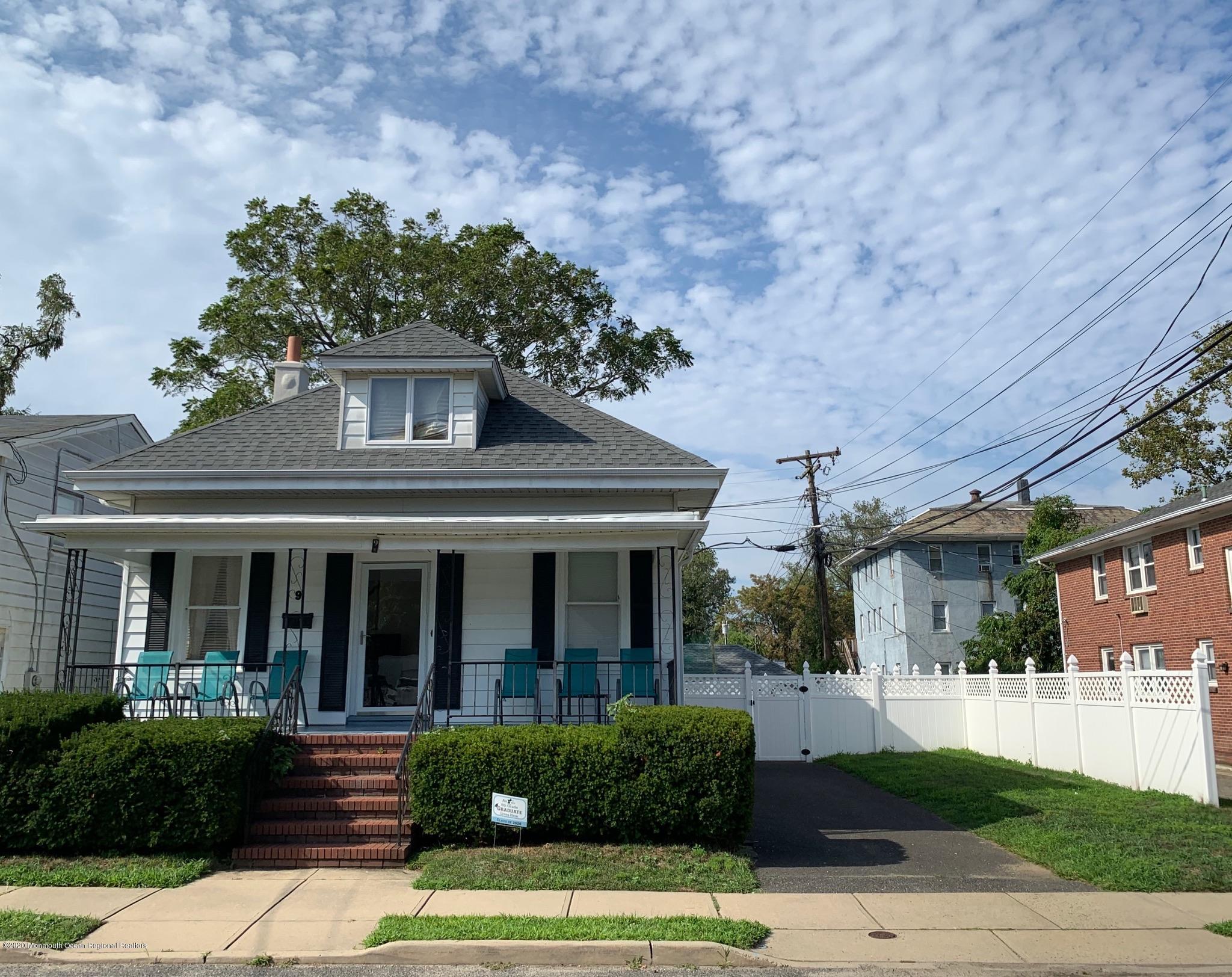 9 Wyckoff Street Deal, NJ 07723 - Photo 1 of 15 a front view of a house with a yard