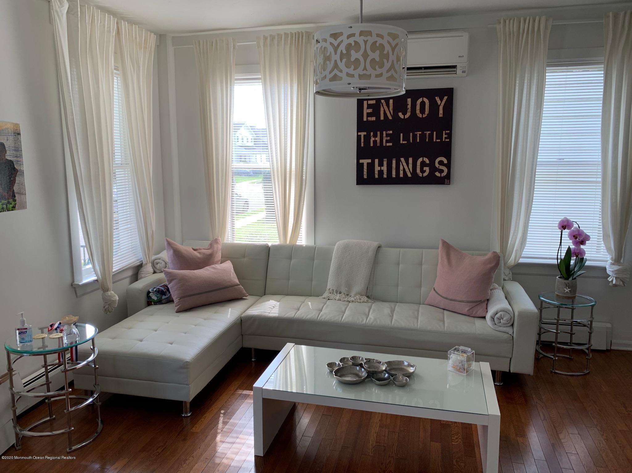 9 Wyckoff Street Deal, NJ 07723 - Photo 2 of 15 a living room with furniture and a large window