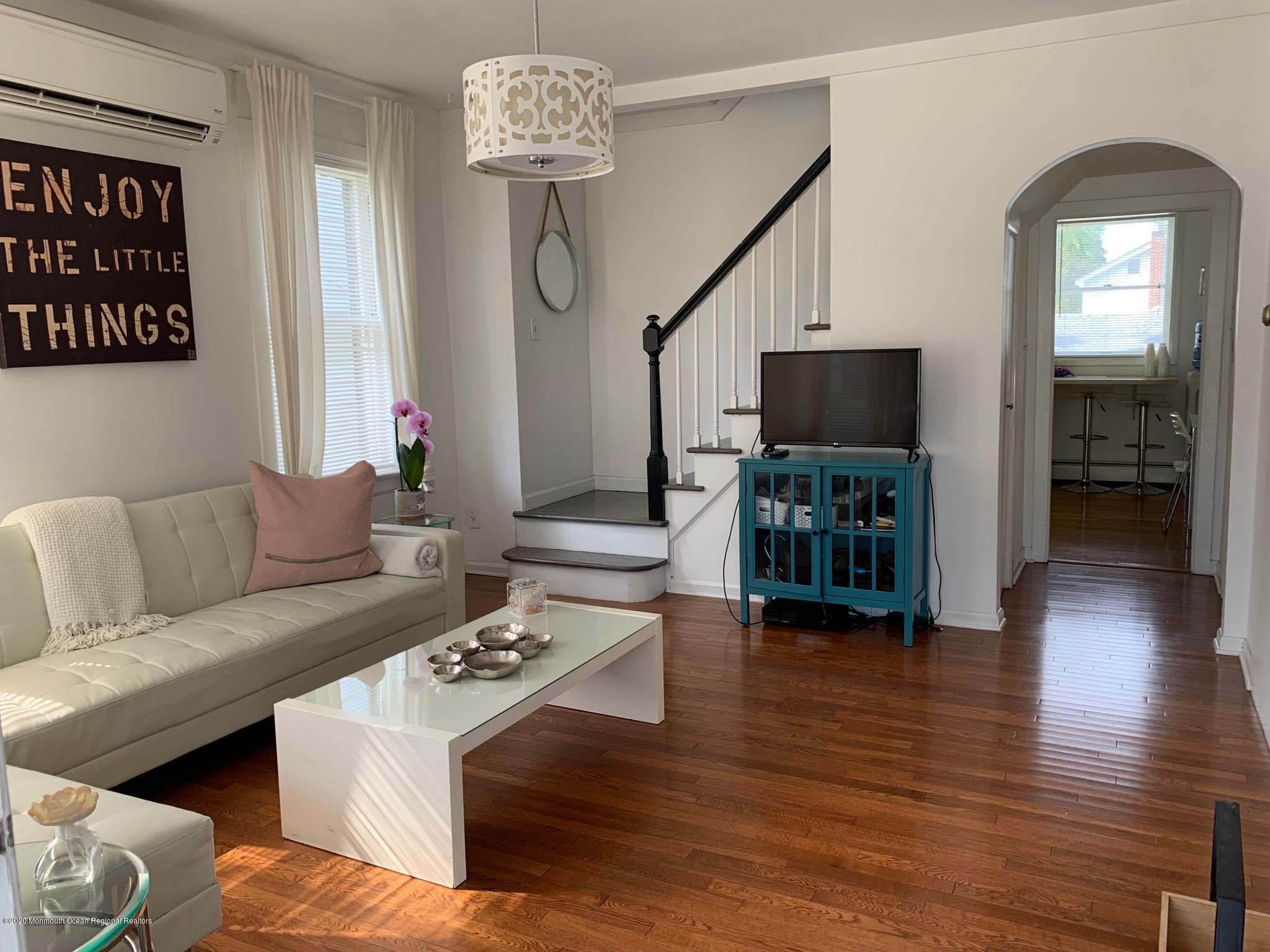 9 Wyckoff Street Deal, NJ 07723 - Photo 3 of 15 a living room with furniture and a flat screen tv