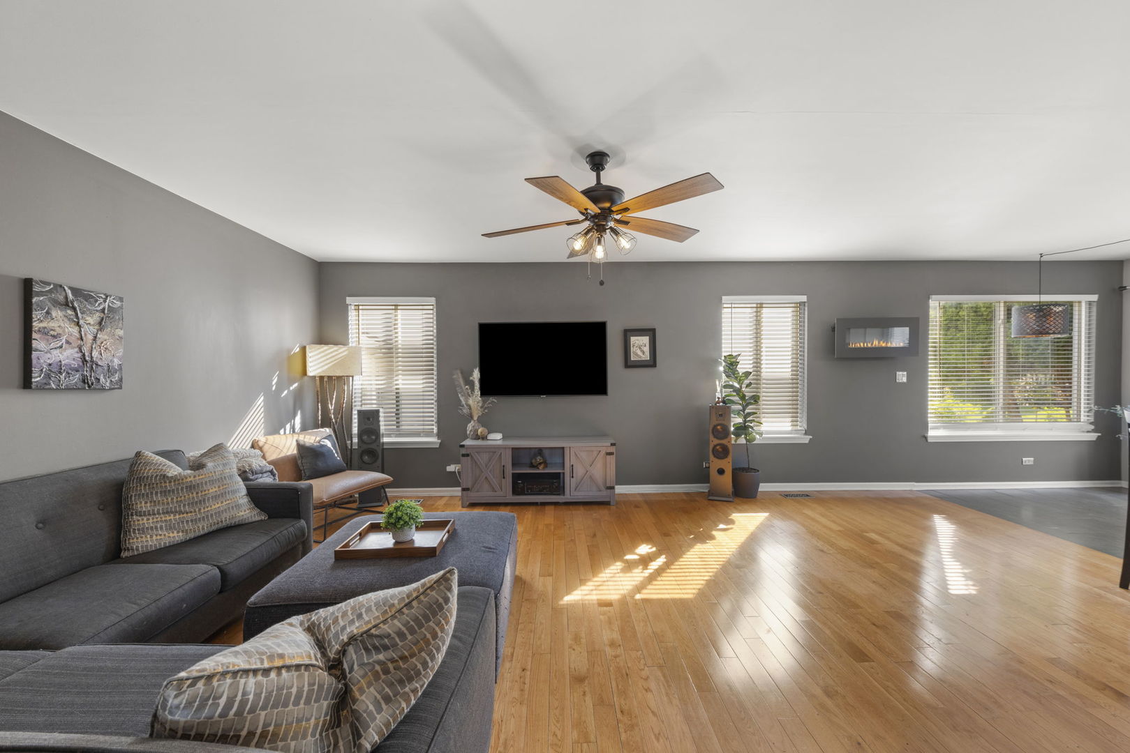 2132 Feldott Lane Naperville, IL 60540 - Photo 12 of 33 a living room with furniture and a flat screen tv