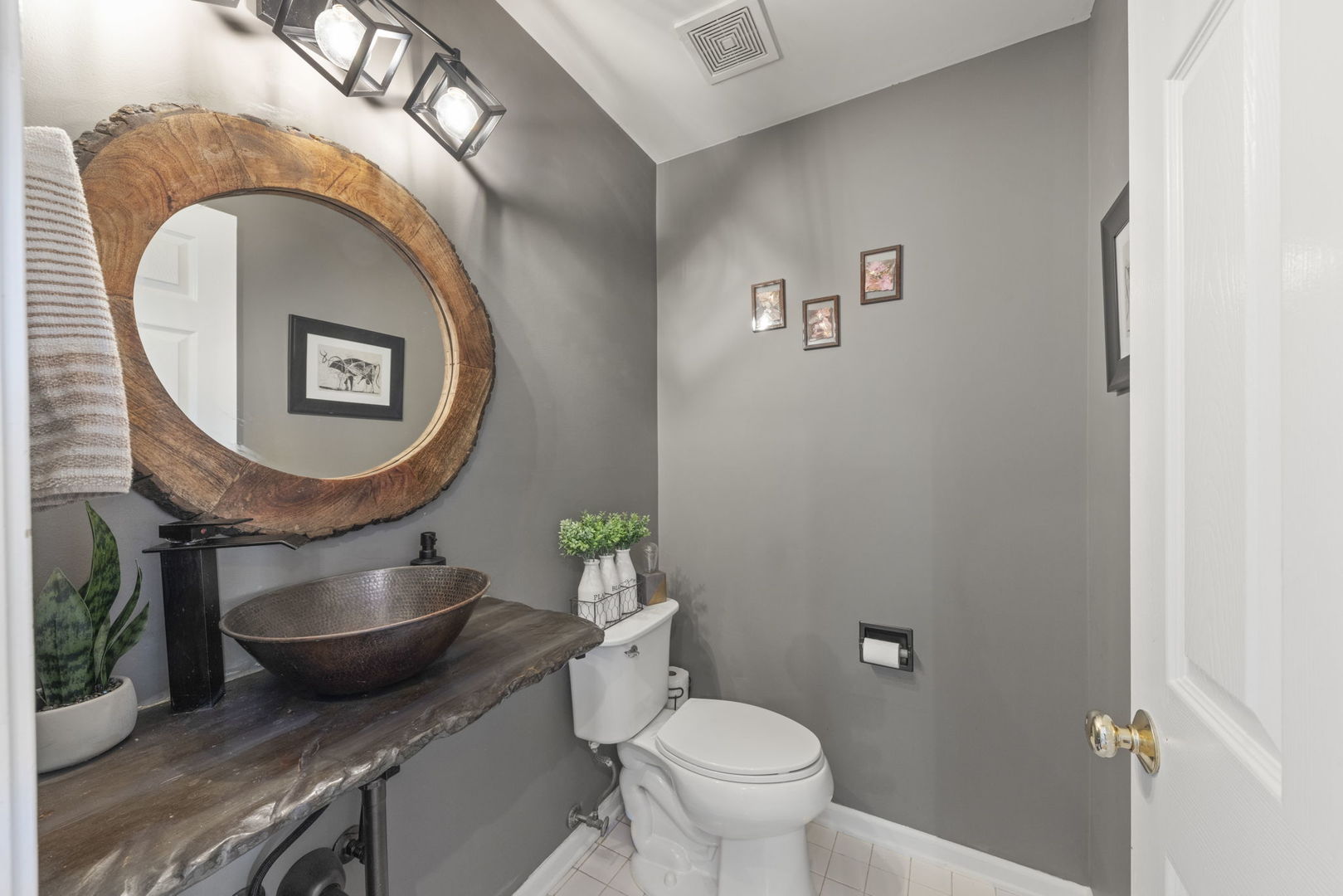 2132 Feldott Lane Naperville, IL 60540 - Photo 16 of 33 a bathroom with a toilet a sink and mirror