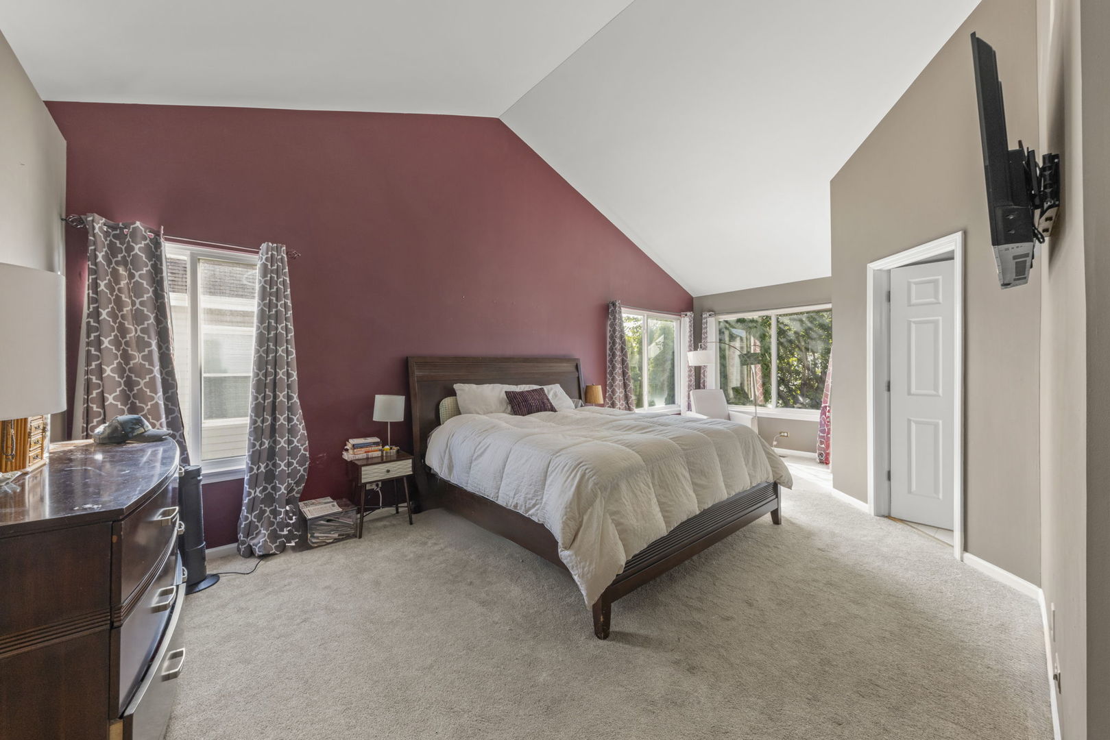 2132 Feldott Lane Naperville, IL 60540 - Photo 18 of 33 a bed sitting in a bedroom next to a window