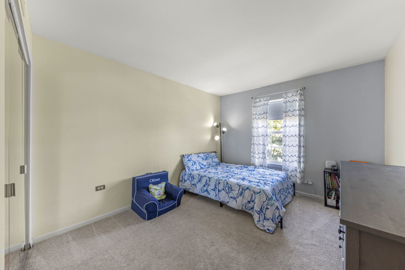 2132 Feldott Lane Naperville, IL 60540 - Photo 21 of 33 a room with a bed and a dresser