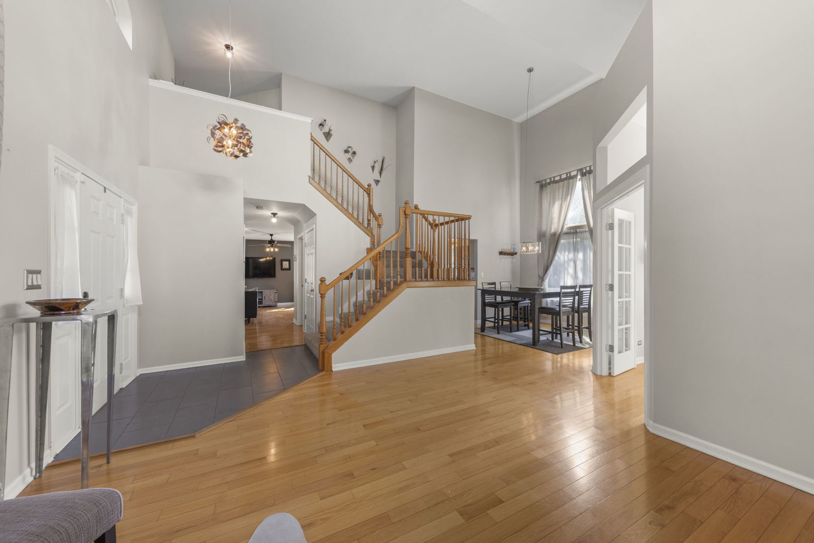2132 Feldott Lane Naperville, IL 60540 - Photo 6 of 33 a view of a livingroom with furniture and stairs