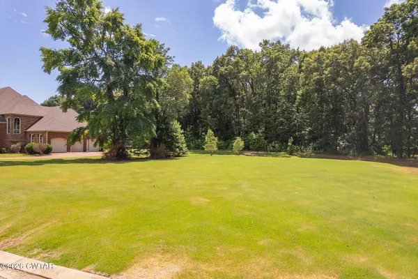a view of outdoor space and swimming pool