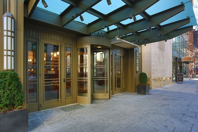 a view of an empty room with a balcony