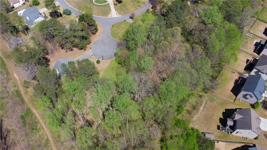 4225 Penion Point Cumming, GA 30028 - Photo 3 of 9 an aerial view of residential houses with outdoor space