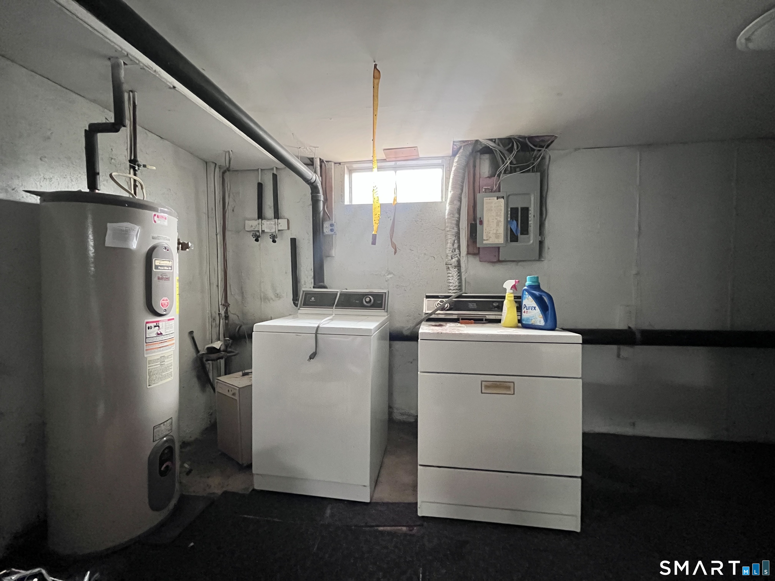 1081 New Haven Road, Unit 11J Naugatuck, CT 06770 - Photo 12 of 17 a room with refrigerator and washer