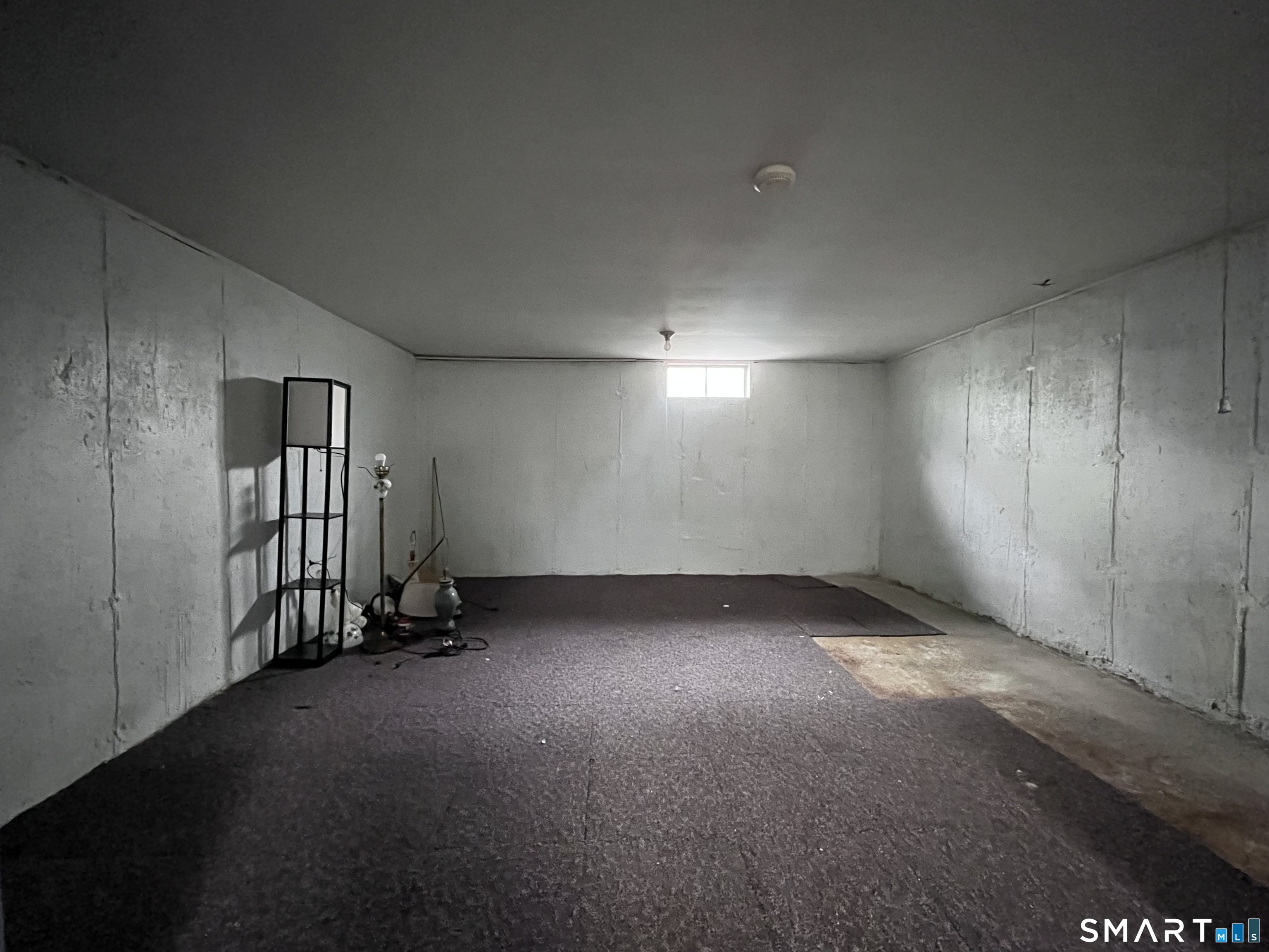 1081 New Haven Road, Unit 11J Naugatuck, CT 06770 - Photo 13 of 17 an empty room with windows