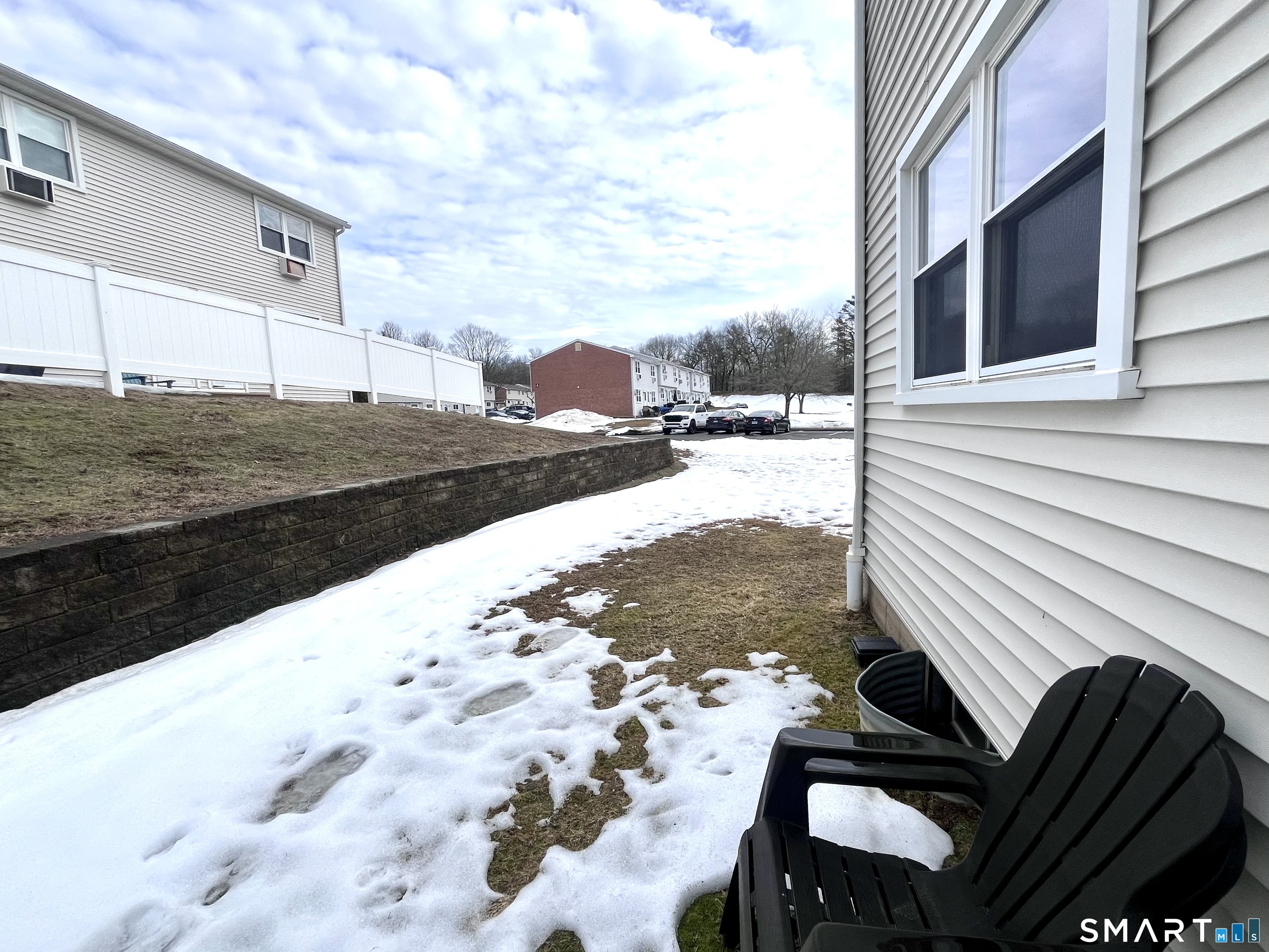 1081 New Haven Road, Unit 11J Naugatuck, CT 06770 - Photo 14 of 17 a view of a backyard of snow