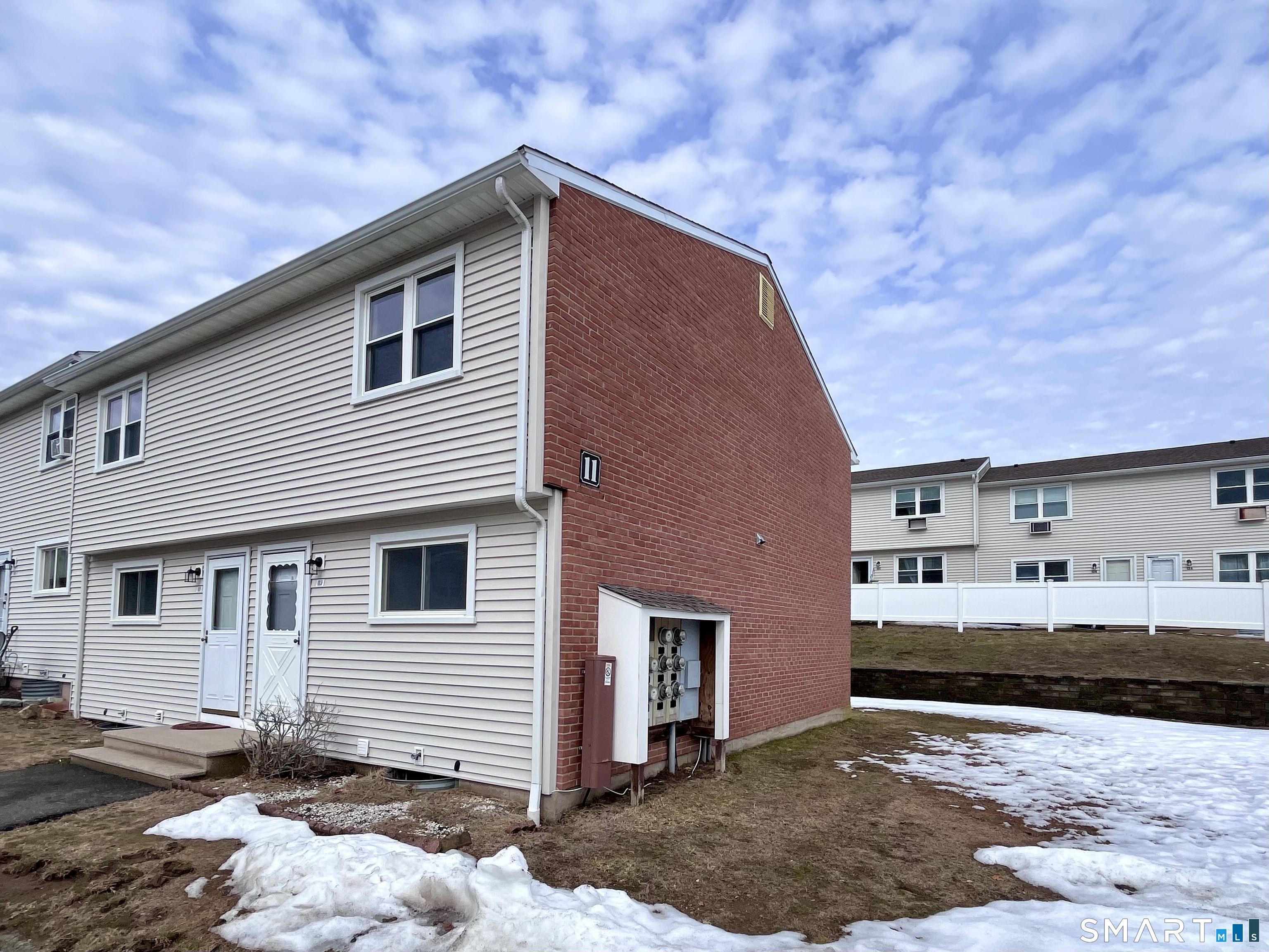 1081 New Haven Road, Unit 11J Naugatuck, CT 06770 - Photo 2 of 17 a view of a house with a yard