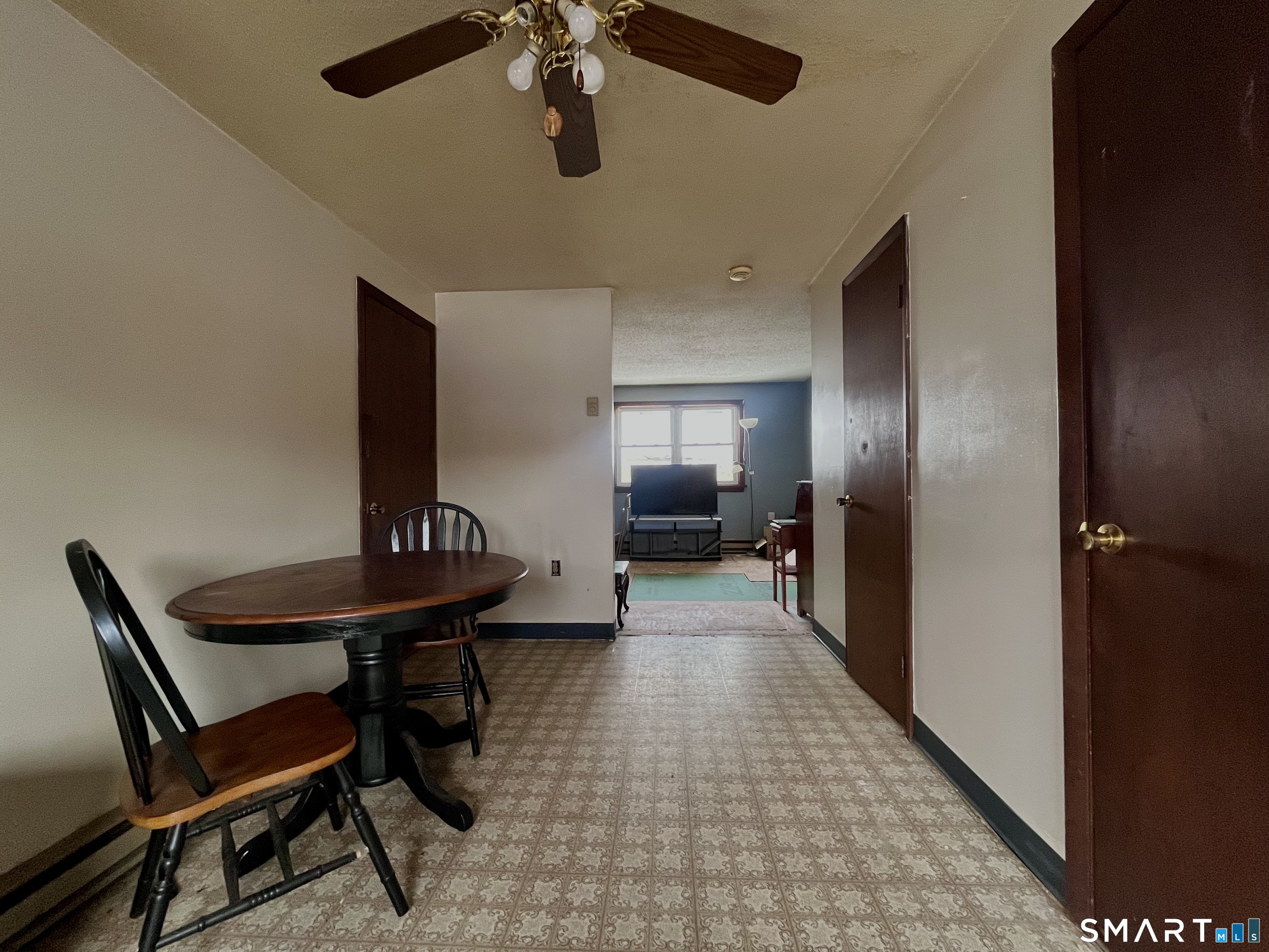 1081 New Haven Road, Unit 11J Naugatuck, CT 06770 - Photo 5 of 17 a view of a hallway with furniture and a chandelier
