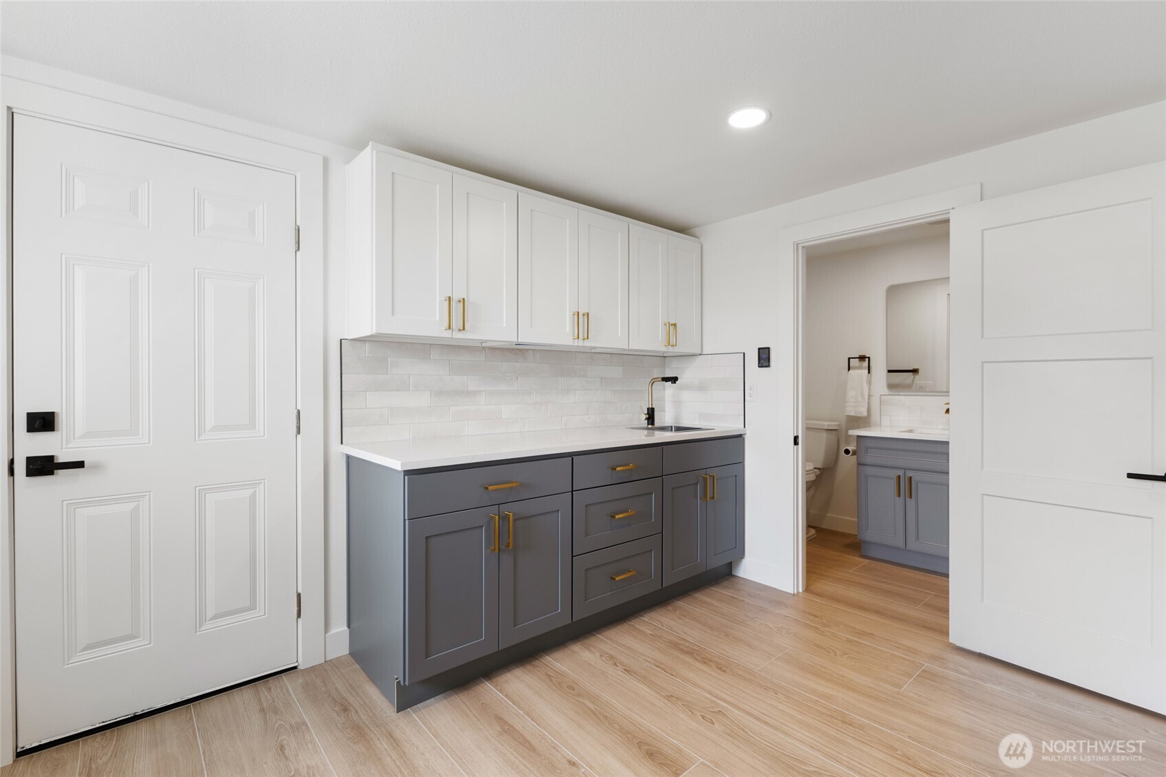 77 Diamond Street Electric City, WA 99123 - Photo 16 of 40 a kitchen with a refrigerator stove and white cabinets